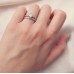 Λευκόχρυσο δαχτυλίδι μονόπετρο και σειρέ Κ14 με ζιργκόν